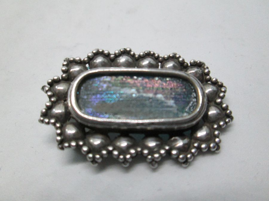 Handmade sterling silver genuine Roman glass brooch set with genuine Roman glass can be used also as a pin. Dimension 2.3 cm X 3.5 cm approximately.