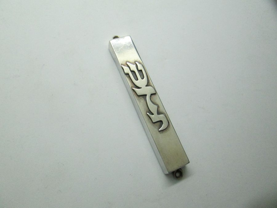 Sterling silver Mezuzah Shaddai vintage made in Israel 1960's. Suitable for parchment up to 6 cm .Dimension 1 cm X 7.2 cm approximately.
