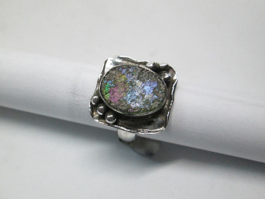 Handmade abstract style sterling silver ring abstract Roman glass set with a genuine antique Roman glass found in the holyland Israel.