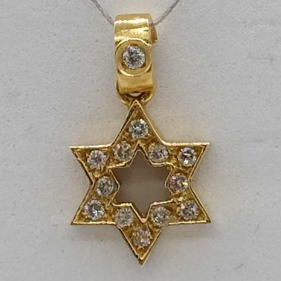 18 Carat yellow gold star of David set with 13 genuine white diamonds total weight 11 pts, VVS clarity white color 0.9 cm X 1 cm X 0.2 cm approximately.