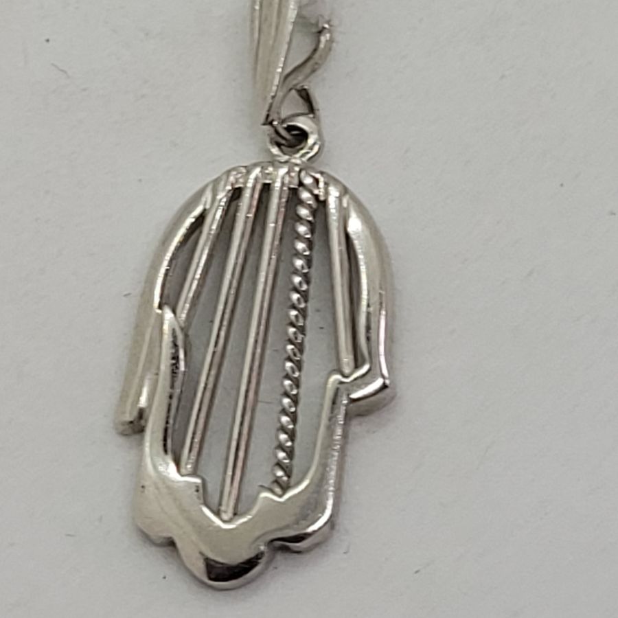 Handmade 14 carat white gold Hamsa Chamsa white gold wires pendant different design wires. Dimension 1.5 cm X 2.5 cm X 0.25 approximately.