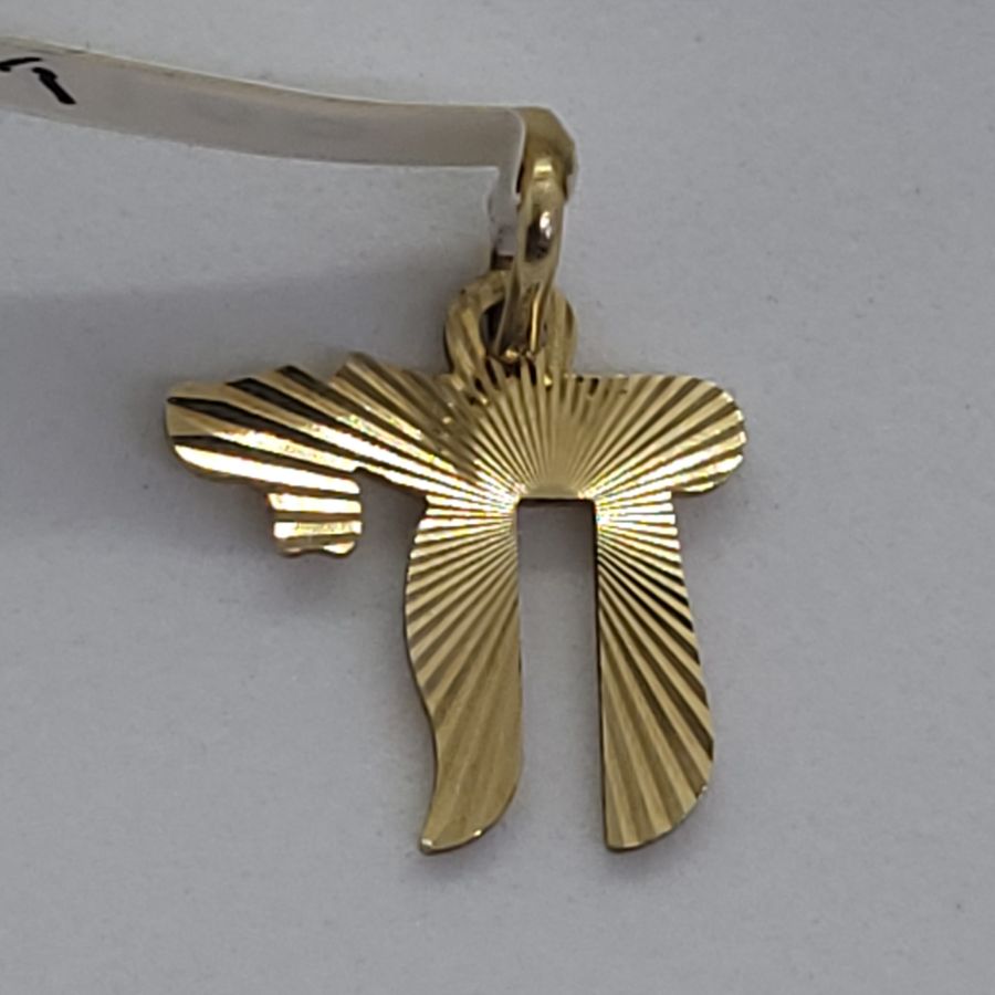 Handmade 14 carat solid gold Hay diamond cut suitable for boys and girls. Dimension 1.45 cm X 1.2 X 0.08 cm approximately.