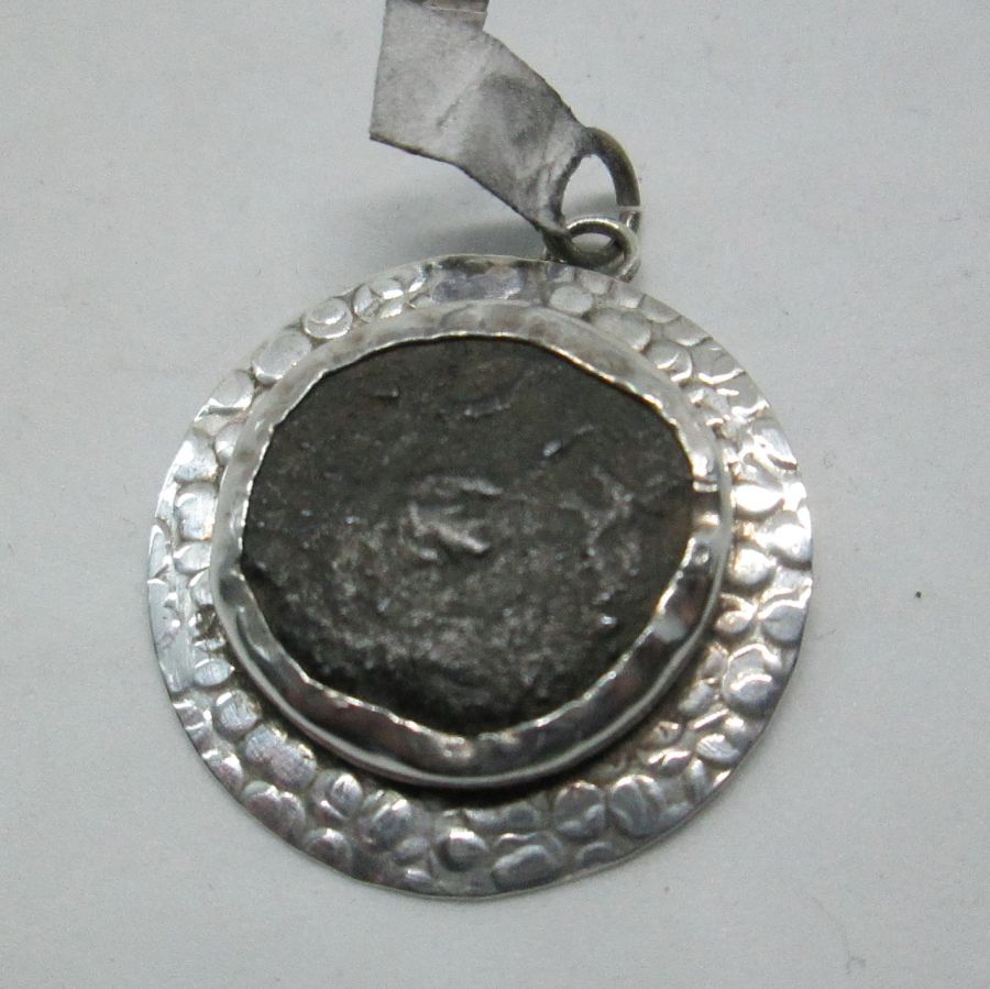 Silver Pendant Hand Hammered and set with coin. Sterling silver hand hammered pendant set with genuine antique Jewish coin from the first century AD.
