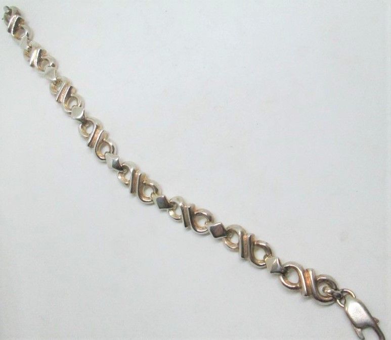Handmade sterling silver bracelet infinity symbol contemporary shape design. Dimension 0.9 cm X 19.8 approximately.