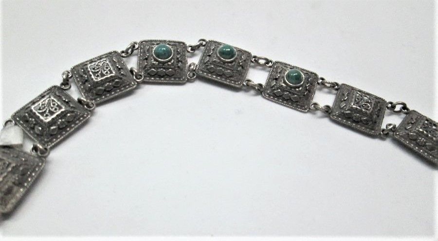 Sterling silver bracelet Yemenite Filigree Elat stones square shape and polished. Dimension 1.25 cm X 18 cm approximately.