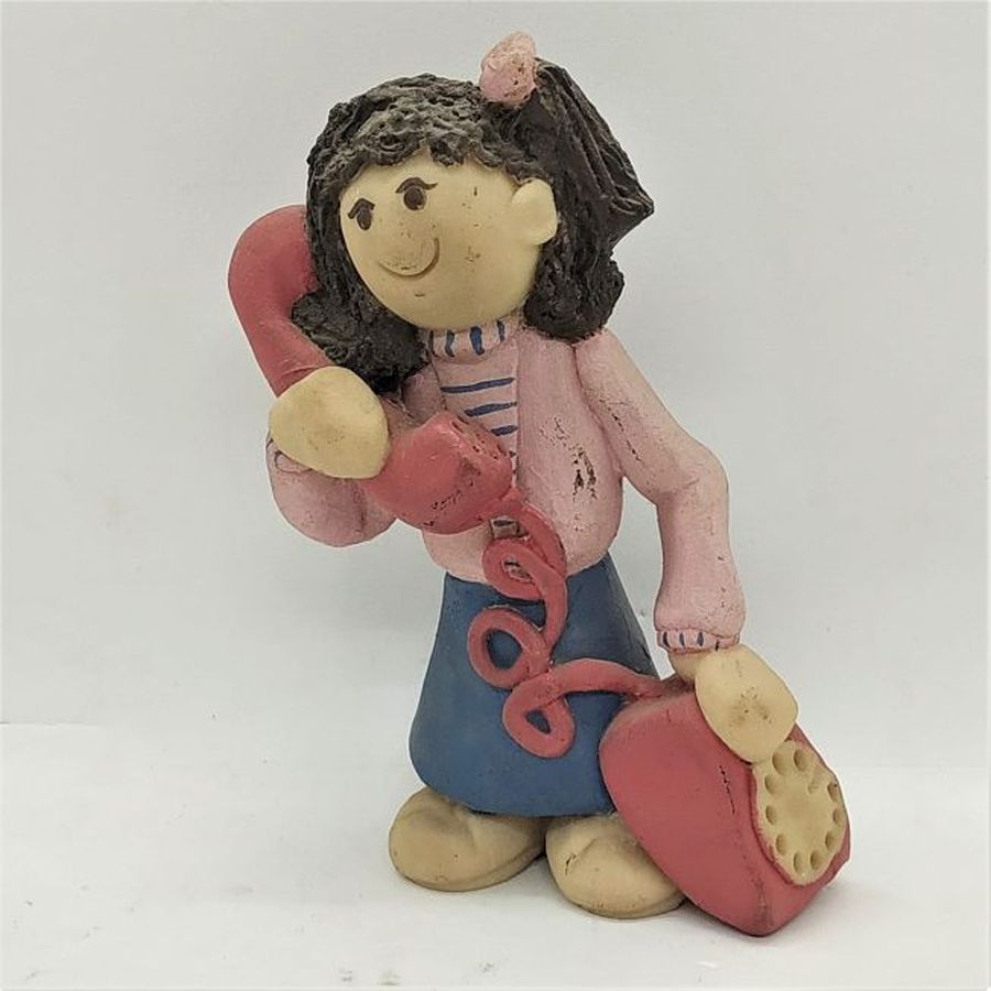 Handmade Girl Chatting Ceramic Sculpture on the traditional phone made by Sakolovsky. Dimension 11 cm X 5 cm X 7 cm approximately.