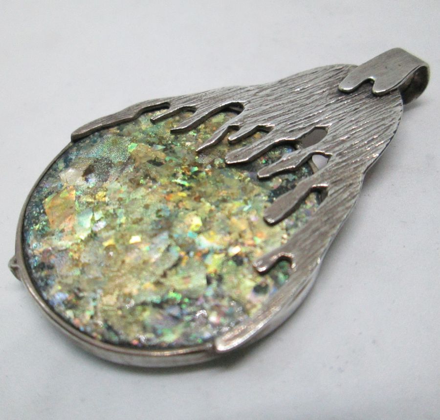 Handmade sterling silver Roman Glass Silver pendant set with genuine Roman glass contemporary style. Dimension 3.2 cm X 4.5 cm approximately.
