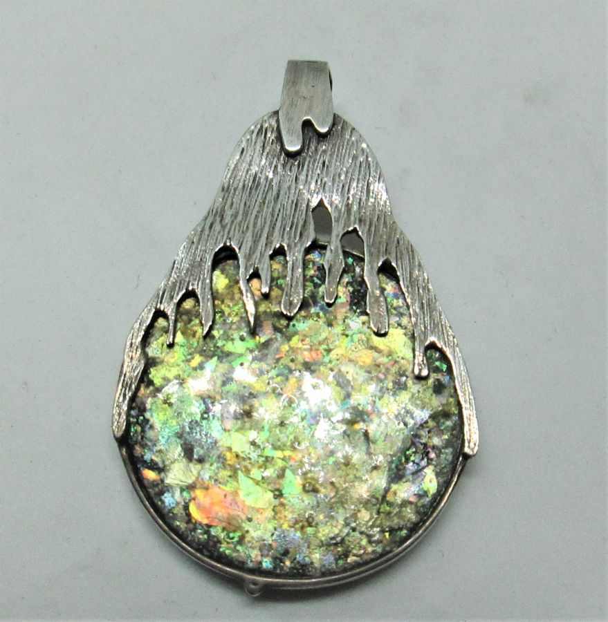 Handmade sterling silver Roman Glass Silver pendant set with genuine Roman glass contemporary style. Dimension 3.2 cm X 4.5 cm approximately.