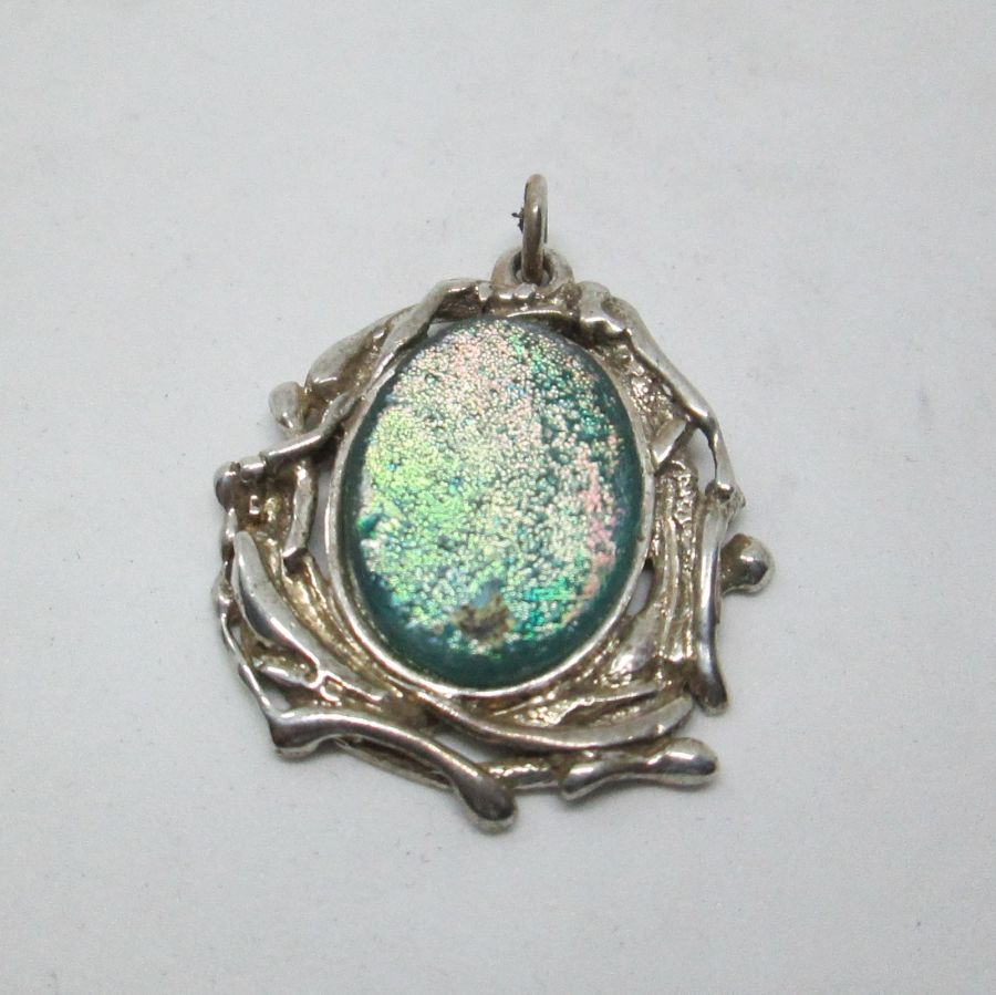 Handmade sterling silver Abstract Roman Glass pendant set with genuine Roman glass contemporary style. Dimension 2.9 cm X 3.4 cm approximately.