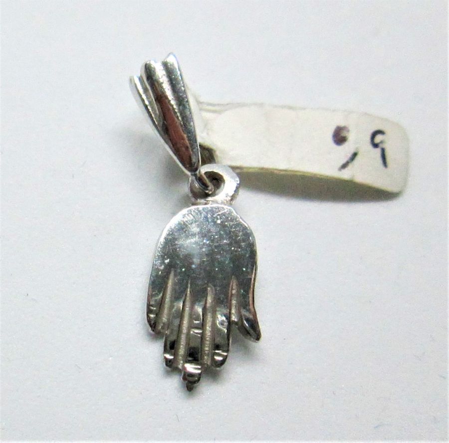 Handmade 14 carat white gold Hamsa Chamsa Tiny White Gold ,very small Hamsa pendant. Dimension 0.7 cm X 12 cm X 0.1 approximately.