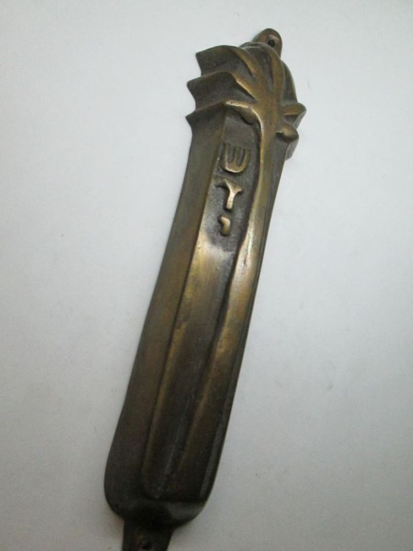Bronze Mezuzah palm tree design with brown patina, suitable for parchment up to 14 cm. Dimension 4.4 X 18.3 cm approximately.
