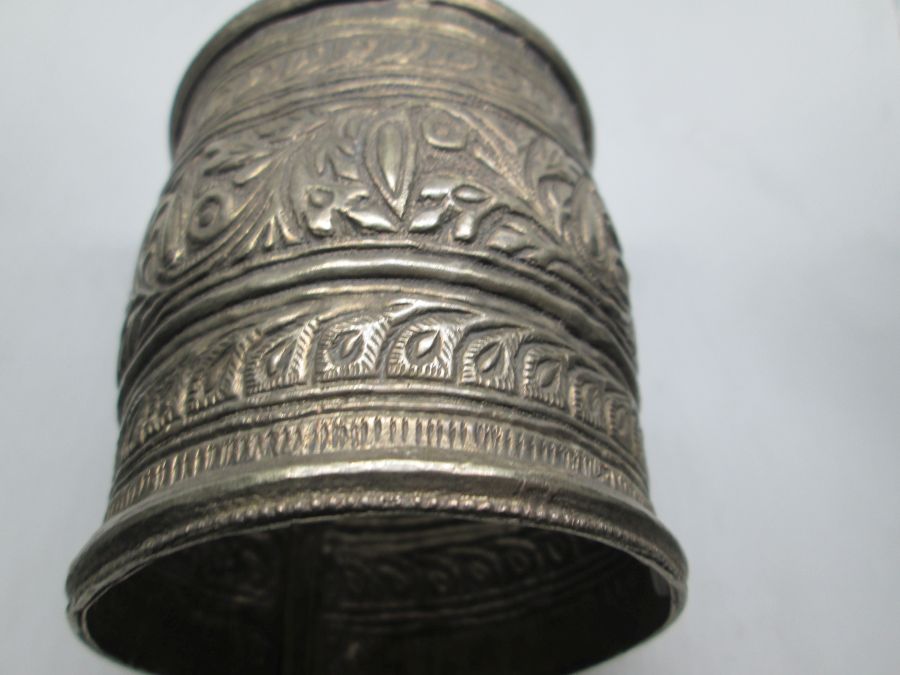 Vintage jewelry wide bracelet handmade low silver bracelet hand hammered different designs made by middle East nomads 8 cm X diameter 7.5 cm approximately.