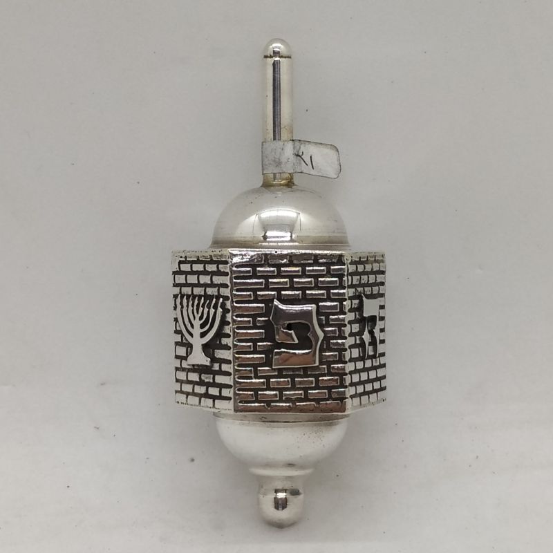 Handmade sterling silver Dreidel Silver Hexagon Kotel contemporary design with Jerusalem walls. Dimension 3.5 cm X 3.1 X 7.8 cm.