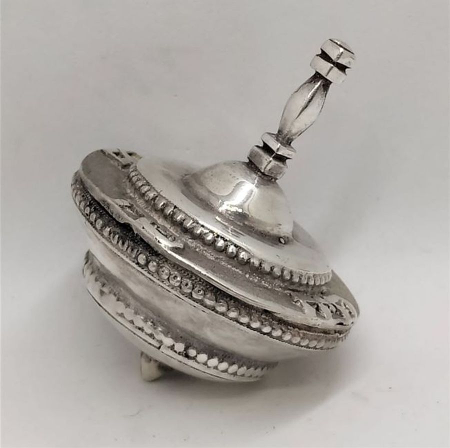 Handmade Hanukah Dreidel Sevivon Round traditional shape with full Hebrew words " Great miracle happened here". Dimension diameter 3.2 cm X 4.5 cm.