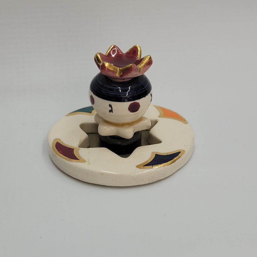 Hanukah Dreidel Ceramic Pomegranate Sevivon handmade. Grebler the ceramicist designed this spinning pomegranate on a hinge easy for easy spinning.