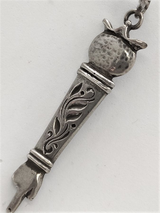 Torah Yad Pointer Pendant sterling silver handmade with engravings with a pomegranate at top of pendant 5.5 cm X 1.2 cm approximately.