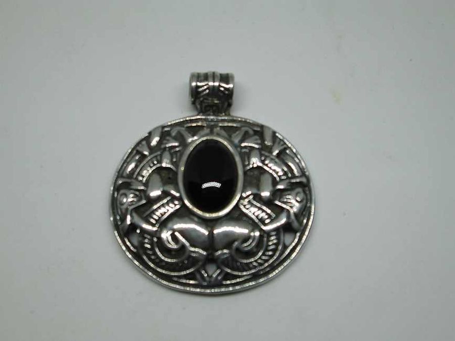 Contemporary handmade sterling silver pendant black Onyx set with oval cabochon cut black Onyx. Dimension 3.9 cm X 4.3 cm approximately.