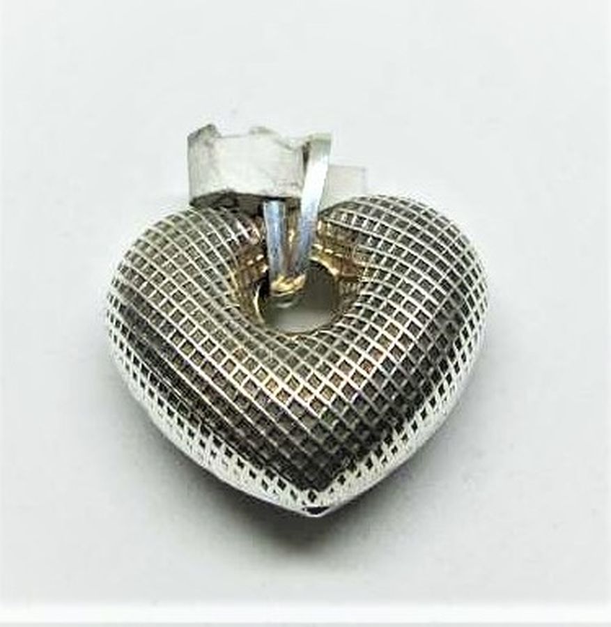 Handmade sterling silver heart shape small pendant 3 dimension heart stripes decorated. Proper gift for Valentine day, 2 cm X 2.4 cm approximately.