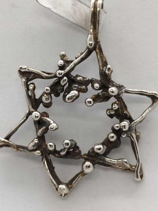 A nice handmade modern style David Star Pendant Abstract suitable for ladies and men. Dimension 3.2 cm X 4.2 cm approximately.