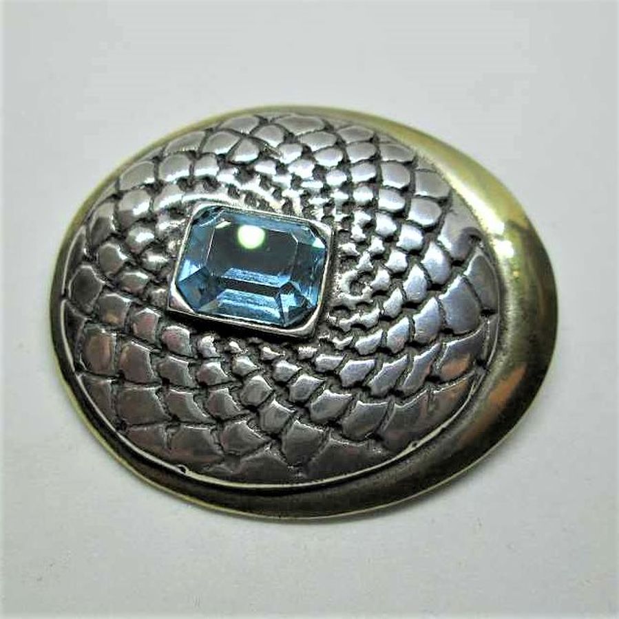 Handmade sterling silver blue Topaz pin & gold plated set with a blue Topaz stone contemporary style. Dimension 3.4 cm X 4 cm approximately.