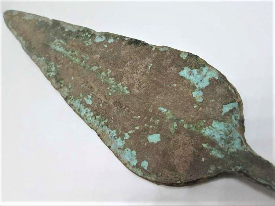 Genuine antique bronze spear head aged 200 BC. From private collection in fine condition. Dimension 12.6 cm X 5.7 cm approximately.