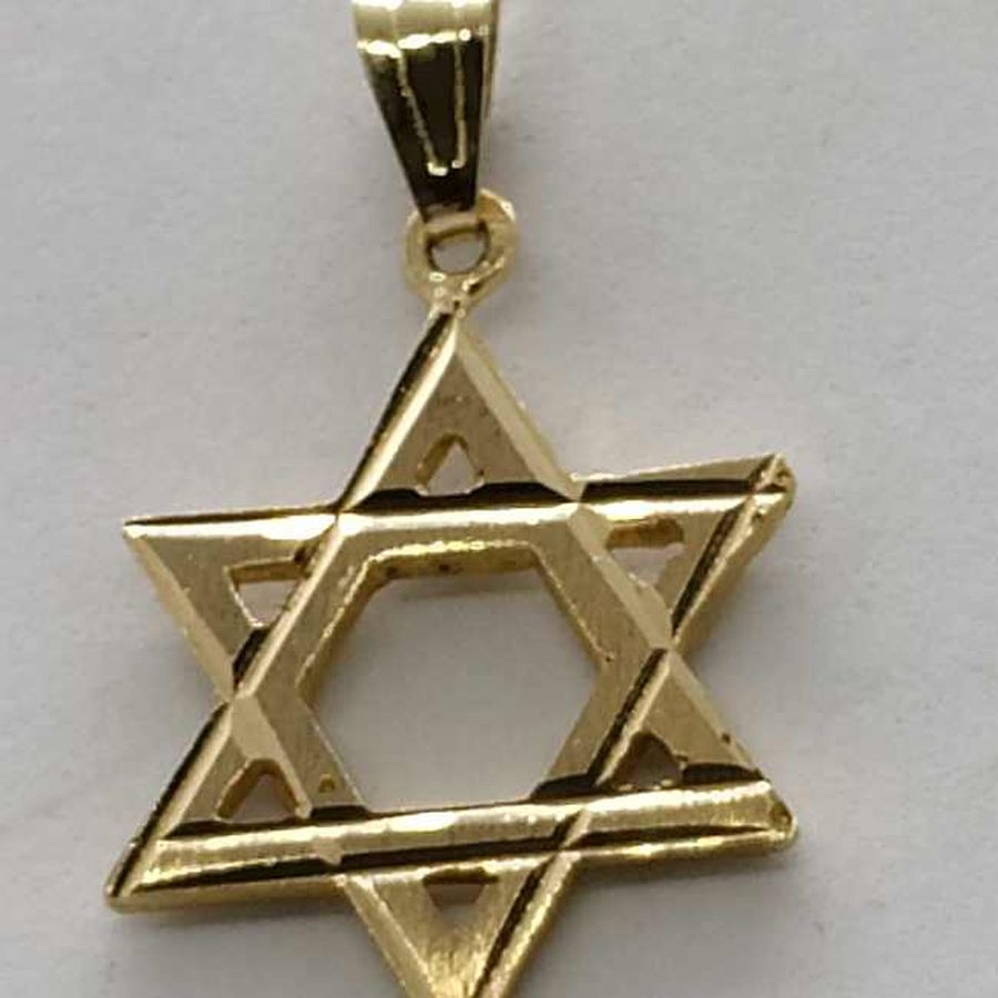 Handmade 14 carat gold traditional solid Magen David diamond cut finish heavy weigh star. Dimension 1.6 cm X 1.9 cm X 0.2 cm approximately.