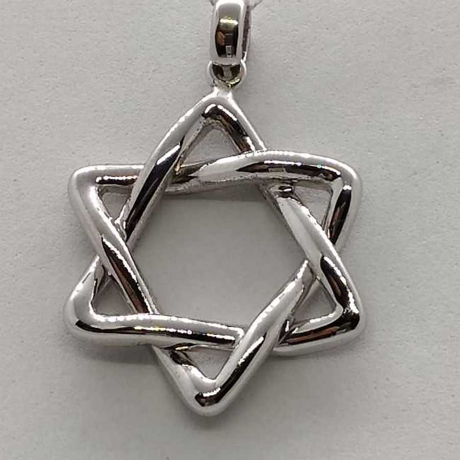 Handmade 14 carat gold Magen David star white gold modern shiny wavy design .Dimension 2.1 cm X 3.3 cm X 0.3 cm approximately.