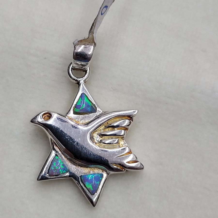 Handmade sterling silver dove shape Magen David star pendant set with 3 opalites stones. Dimension 1.8 cm X 2.75 cm X 0.25 cm approximately.