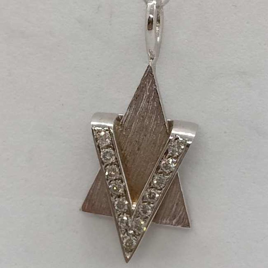 18 carat white gold handmade triangles Magen David star 13 brilliant cut Diamonds set in total weight 8 pts, VVS clarity color white.