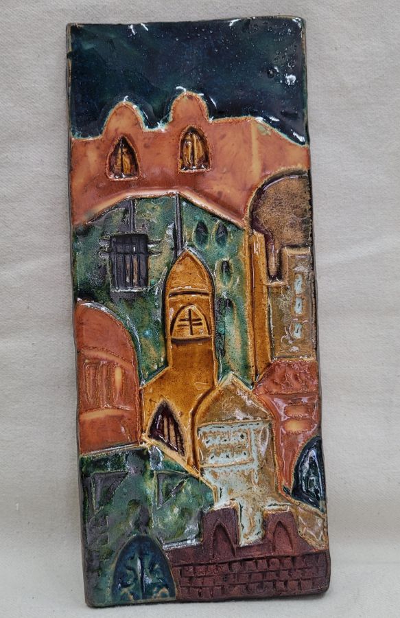 Handmade glazed ceramic Jerusalem houses rectangular tile with different Jerusalem houses in center. Dimension 10 cm X 23 cm approximately.