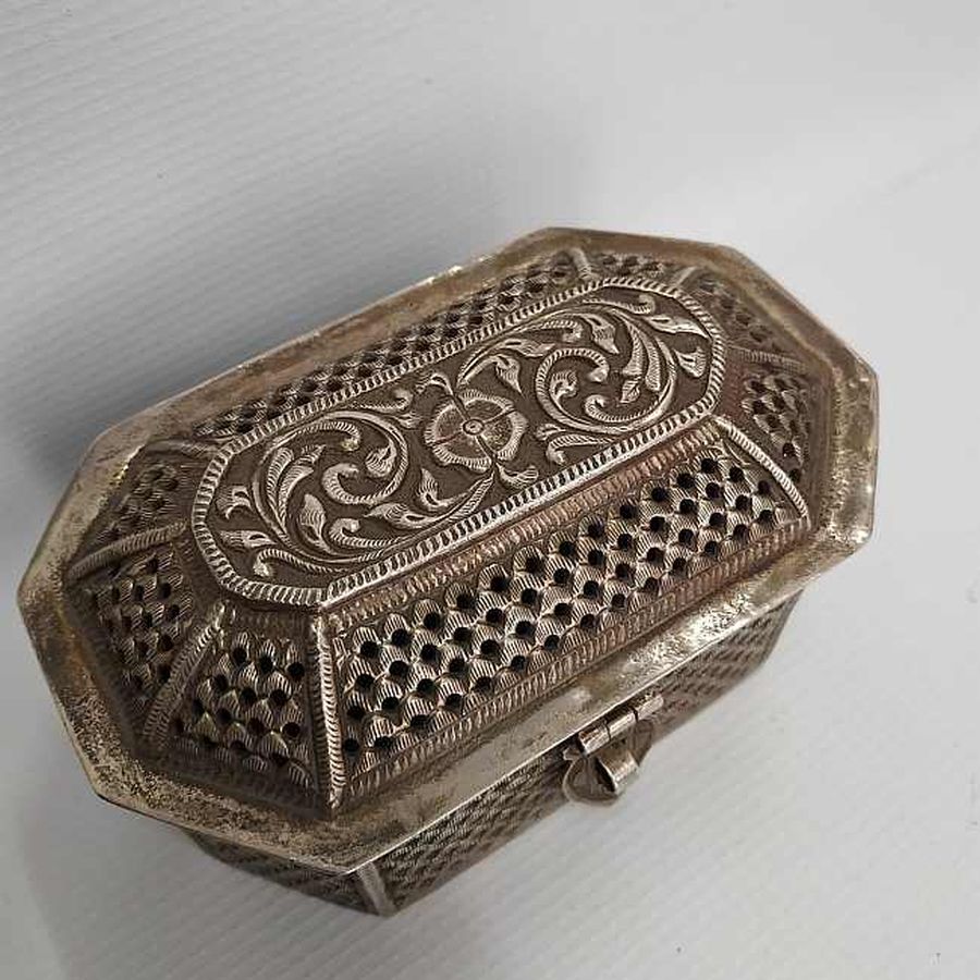 Handmade Etrog cutout box silver vintage for the Sukkot feast of Tabernacles. It is ornate with floral engravings & cut out waves.