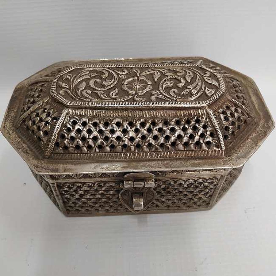 Handmade Etrog cutout box silver vintage for the Sukkot feast of Tabernacles. It is ornate with floral engravings & cut out waves.