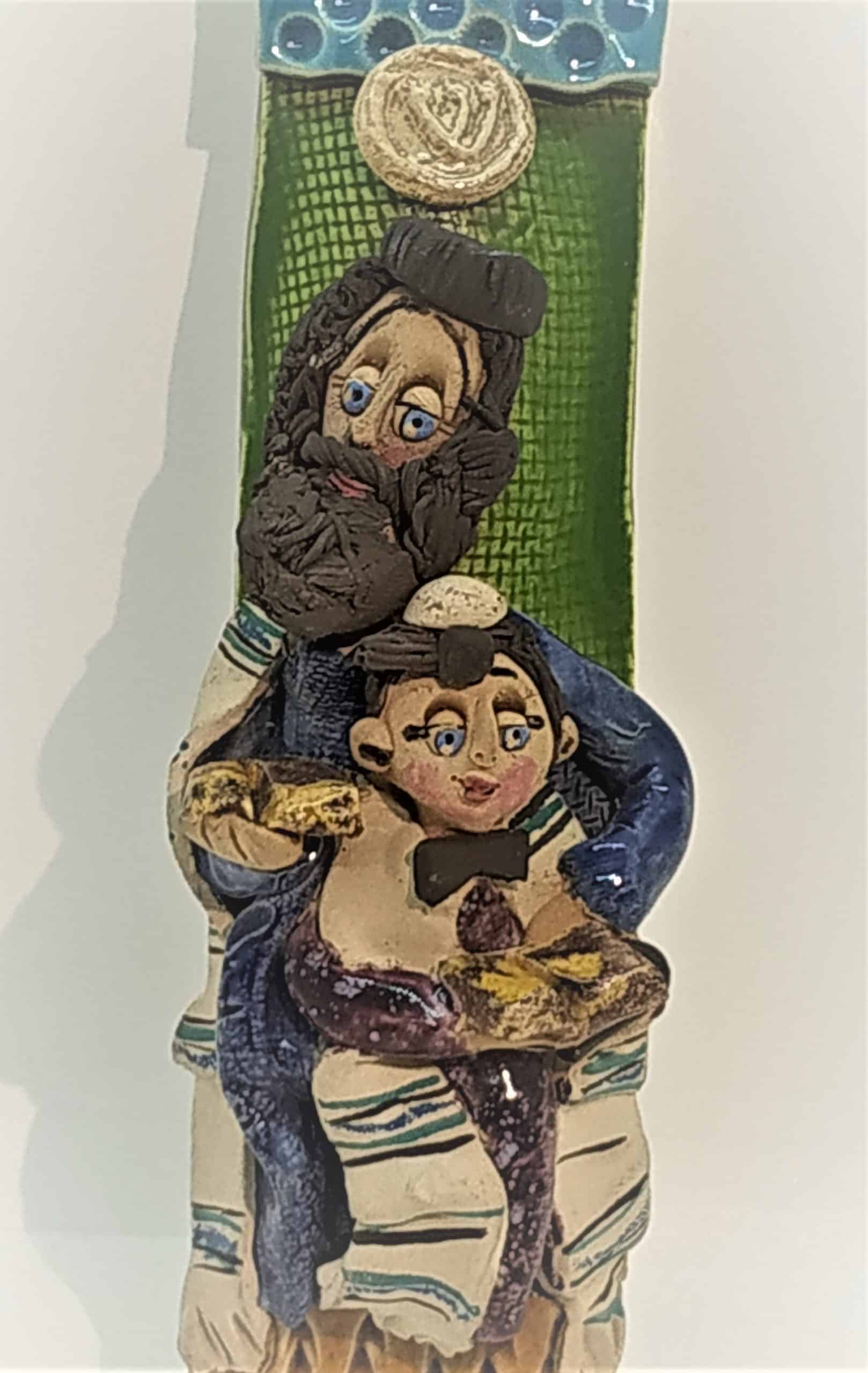 Mezuzah Ceramic Bar Mitzvah .Handmade glazed ceramic Mezuzah by Marina. On it she carved a bar mitzvah boy with father at Torah reading.Dimension 4 cm X 15.5