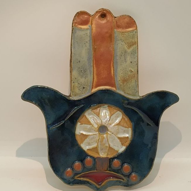 Handmade wall hanging glazed Ceramic Tile Hamsa Round with round design in center of Hamsa, designed and made by Ruth Factor.