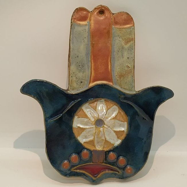 Handmade wall hanging glazed Ceramic Tile Hamsa Round with round design in center of Hamsa, designed and made by Ruth Factor.