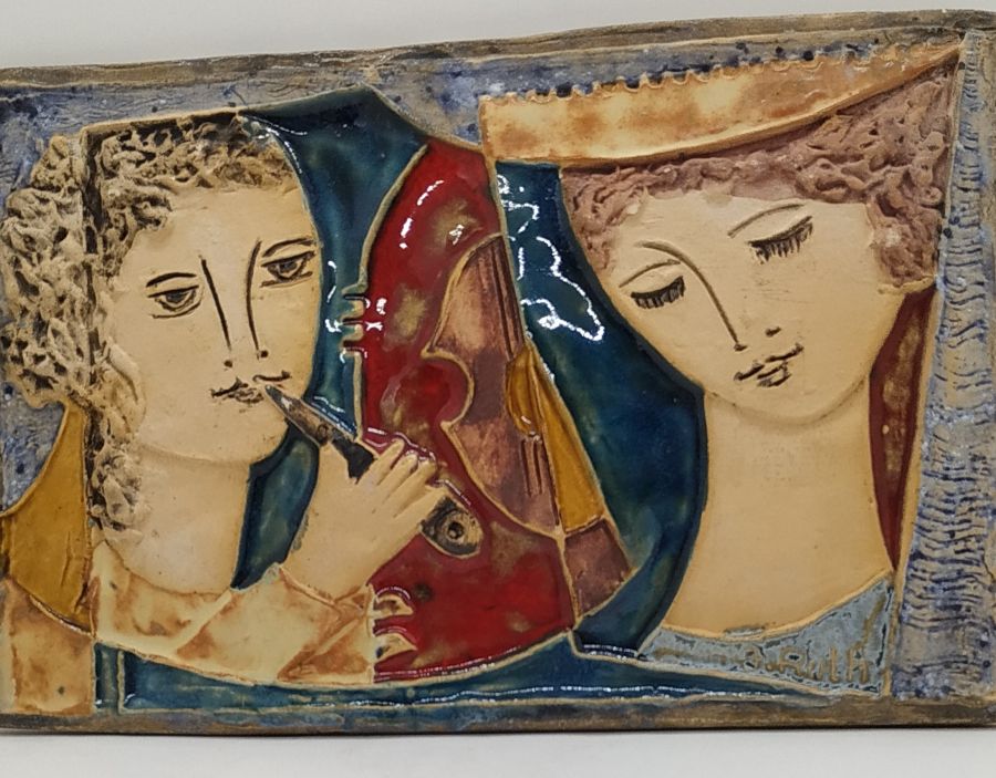 Handmade glazed ceramic Tile Jonathan Playing Flute made by the famous ceramicist Ruth Factor. Dimension 16 cm X 24 cm approximately.