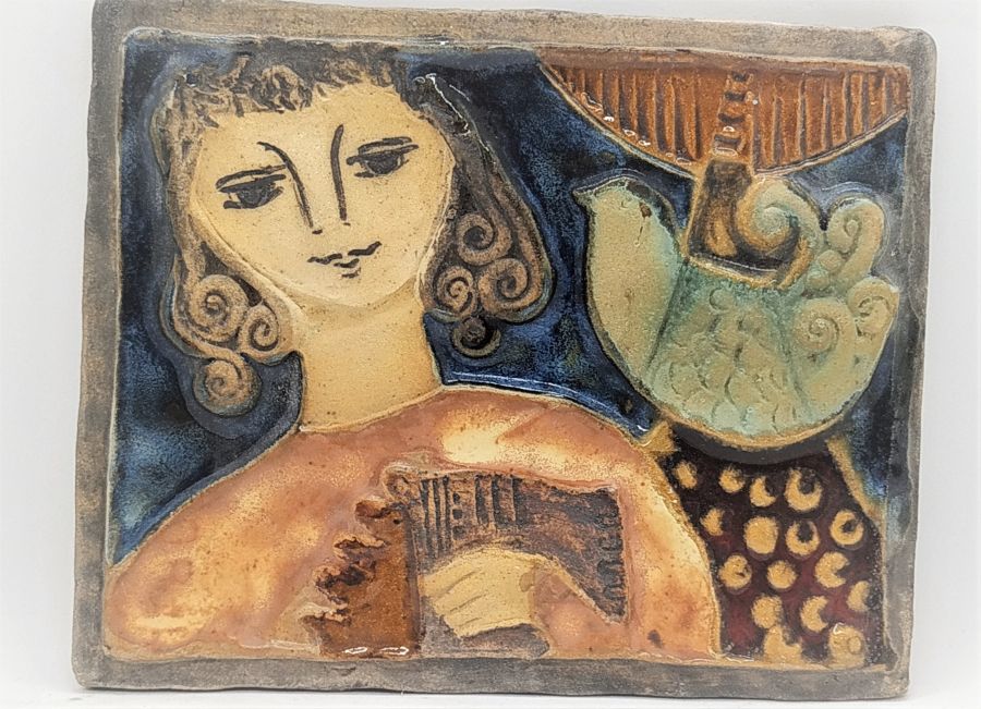 The famous ceramicist Ruth Factor made this glazed ceramic Ruth Factor Tile Bathsheba gazing at the peace dove 14.5 cm X 17.8 cm.