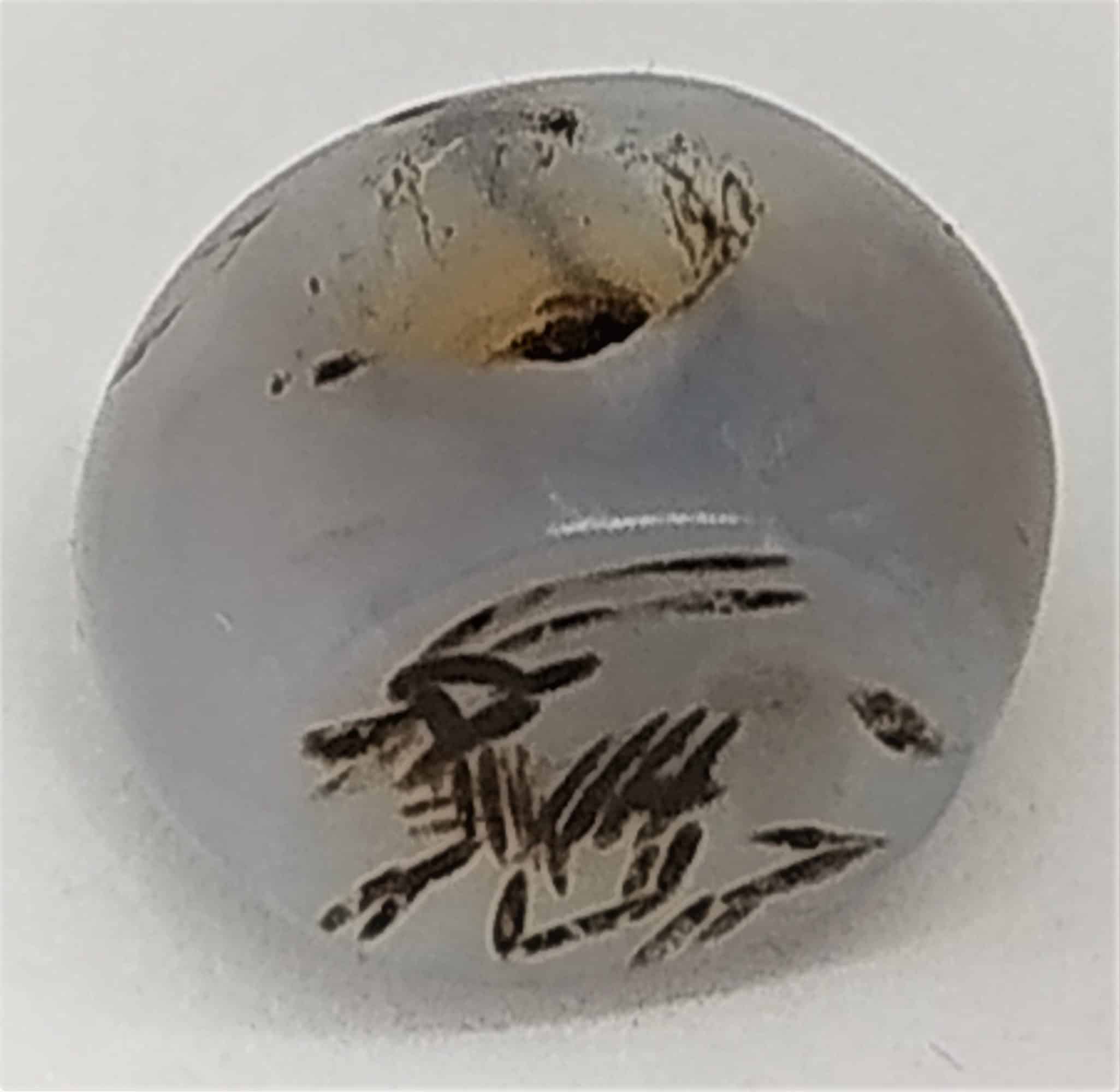 Vintage Seal Agate Bead with deer engraved.Antique personal seal gray agate stone with ancient deer with long horns. Bronze age with a hole in center.