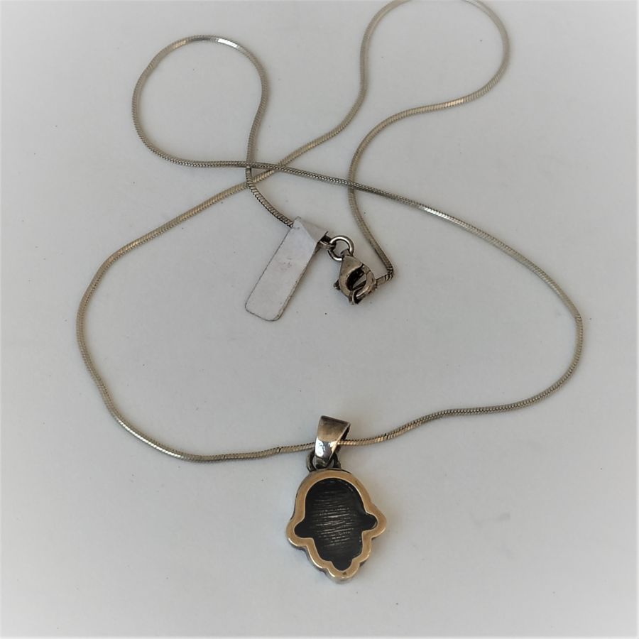 Hamsa Silver Pendant Gold-plated with snake chain. Handmade Hamsa sterling silver pendant gold-plated and oxidized with snake chain.