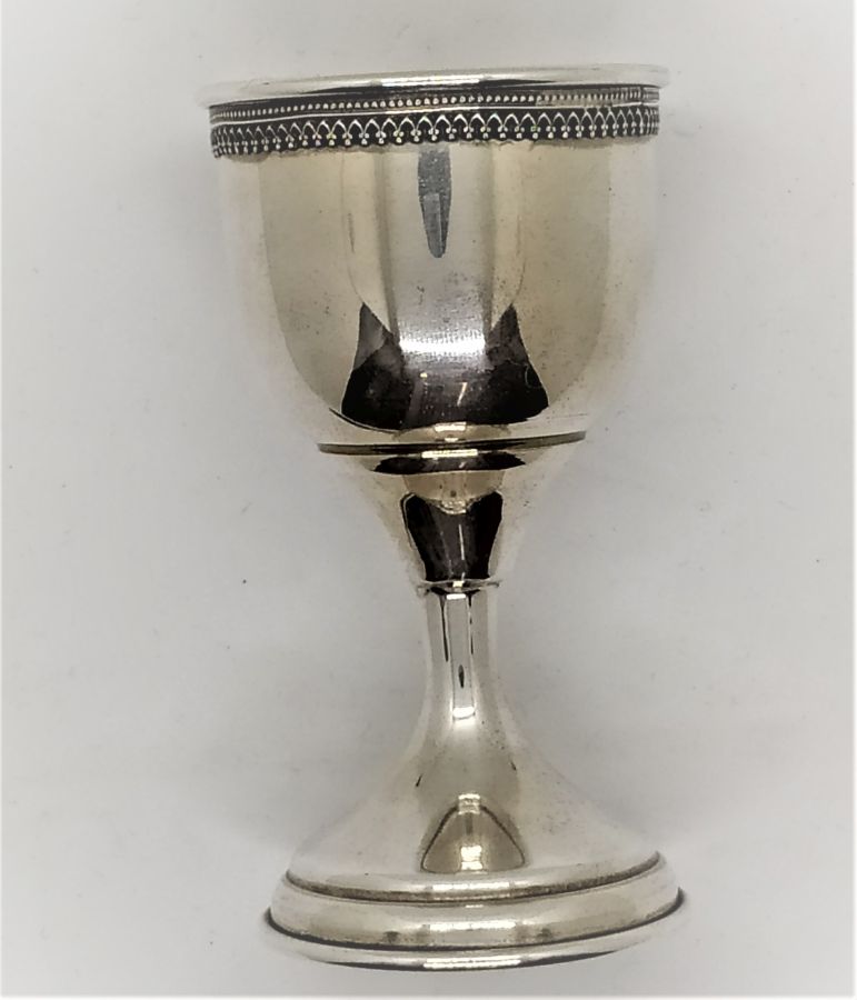 Handmade sterling silver Kiddush cup small size with Yemenite filigree design. Dimension diameter 5.4 cm X 9.4 cm approximately.