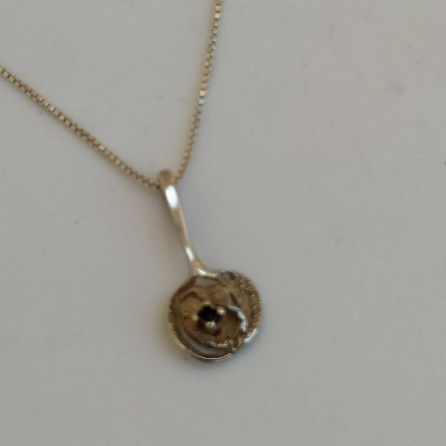 Handmade sterling Silver Pendant Rose Flower shape abstract shape set with genuine sapphire stone and with sterling silver box chain.