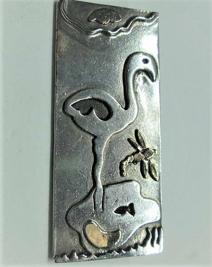 Handmade sterling silver and 14 carat gold Brooch Pendant Silver Stork and gold firefly over lake. Dimension 2.8 cm X 5.2 cm approximately.