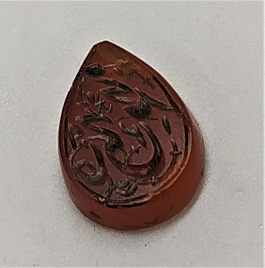 Antique seal Agate Tear drop shape stone with ancient Arabic characteristic name used at ancient times as personal seal. Size 0.8 cm X 1.5 cm.