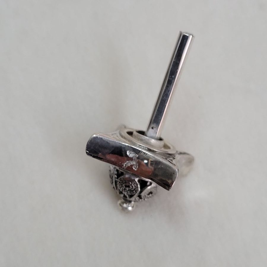 Handmade Dreidel Small Square Repousse design by S. Ghatan Katan. Dimension 1.8 cm X 1.8 cm X 2.55 cm approximately.