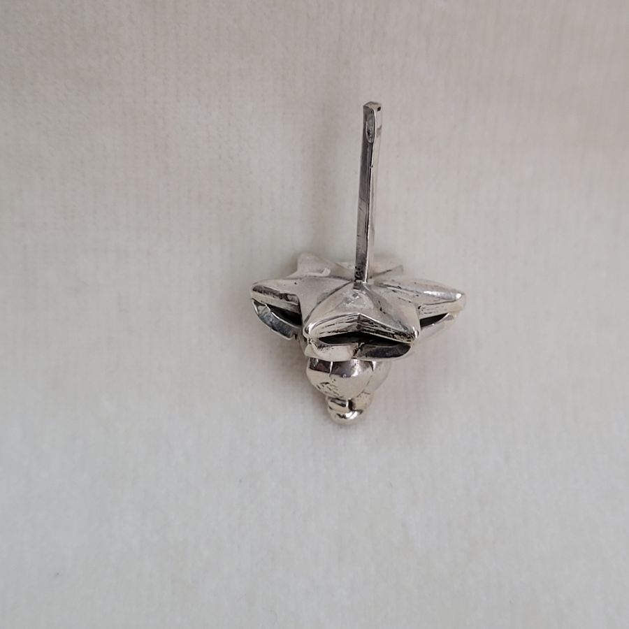 Handmade. Sterling silver handmade Contemporary Magen David Dreidel made by S. Ghatan Katan. Dimension 2 X 2 cm X 3.7 cm approximately.