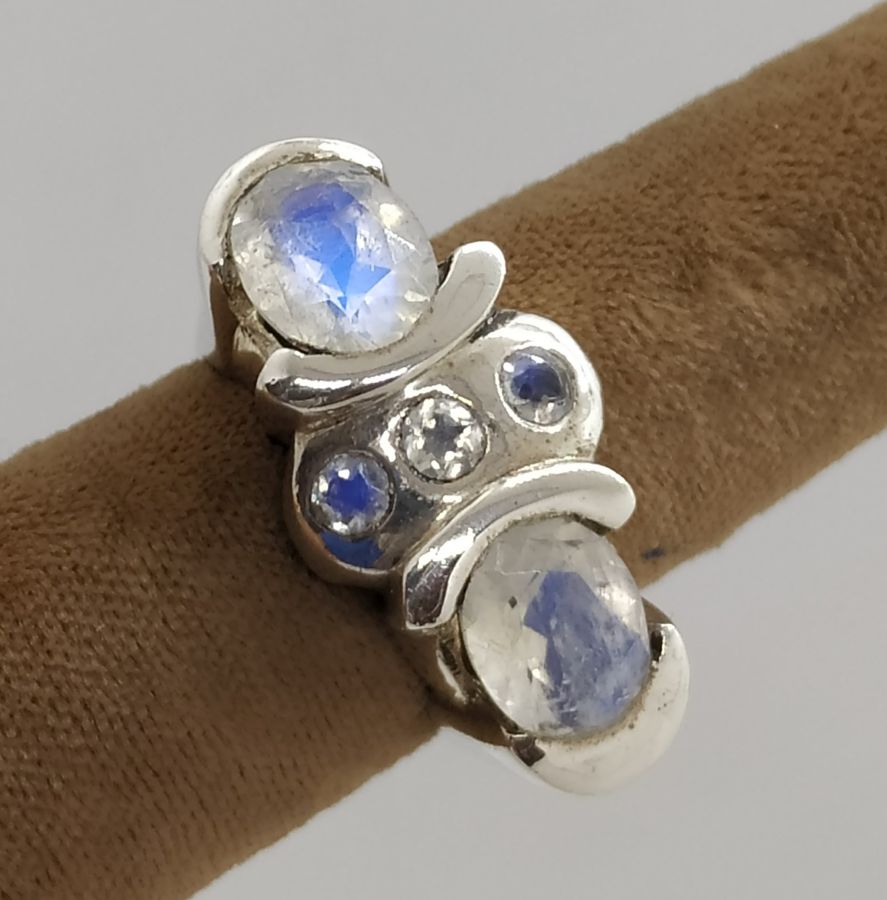 Handmade sterling silver contemporary style Labradorite Zircon stones ring set with 2 faceted white Labradorite stones and 3 white Zircons.