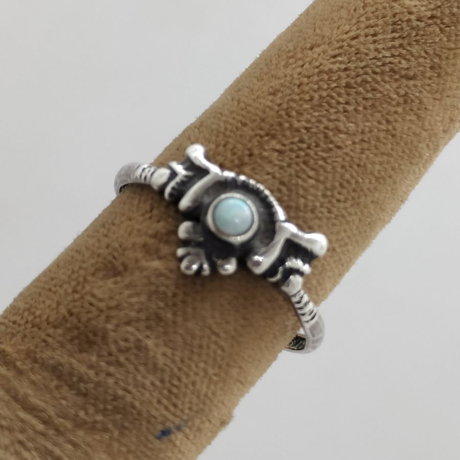 A fine small sterling silver ring white Pearl set incenter suitable for young girls. Dimension 0.6 cm X 1.6 cm approximately.