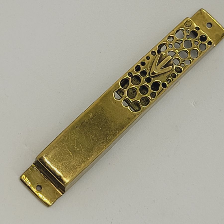Vintage Brass Mezuzah 1960's handmade. Handmade vintage brass Mezuzah 1960's abstract design. Dimension 7.8 cm X 1.3 cm X 0.5 cm approximately.