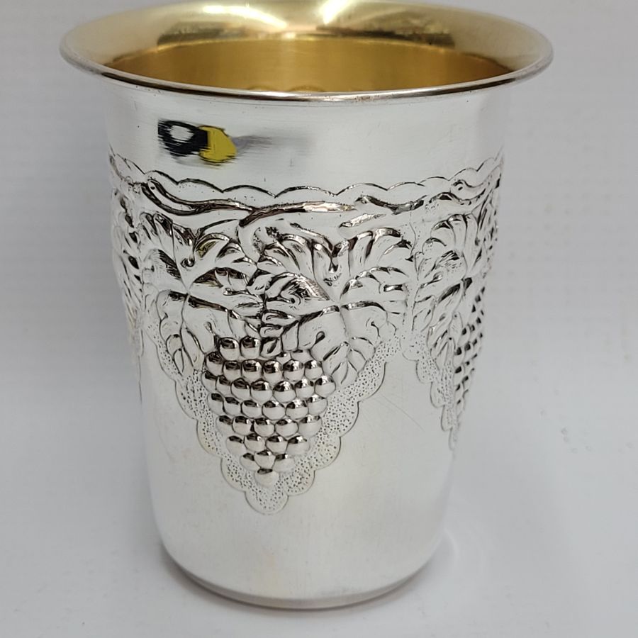 Sterling silver Kiddush goblet grapes leaf cup with grape leaf hand hammered around cup contemporary style diameter 6.8 cm X 7.8 cm approximately.