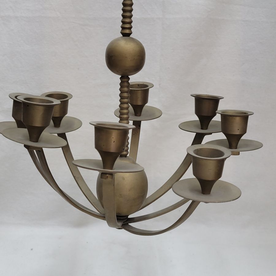 Brass Menorah vintage handmade hanging menorah from Poland early 20th century. They used a solitaire candle as the Shamash ( servant in Hebrew).